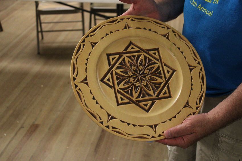 An example of a process known as relief carving.