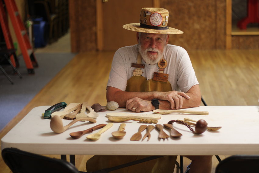 George Basehore shows off his collection of decorative utensils.