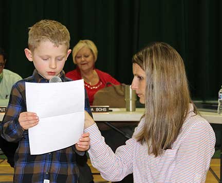 First-grader Tucker Zietz addressed the Eldred Board of Education meeting after an educational unit on selflessness.
