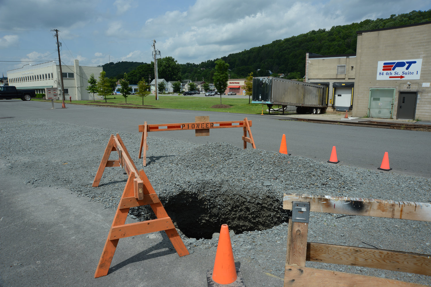DPW recently repaired another sink hole in Top Notch Distributors parking lot, like this one from 2019. Councilor Bill Canfield said the parking lot has similar issues every year.