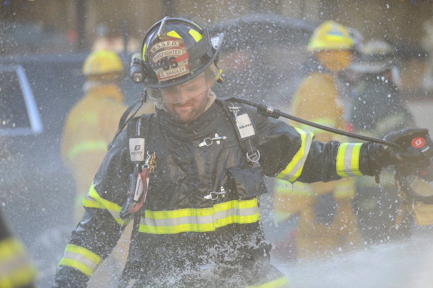 G. Bradley of the White Sulphur Springs VFD was among the firefighters who were hosed down after the fire.