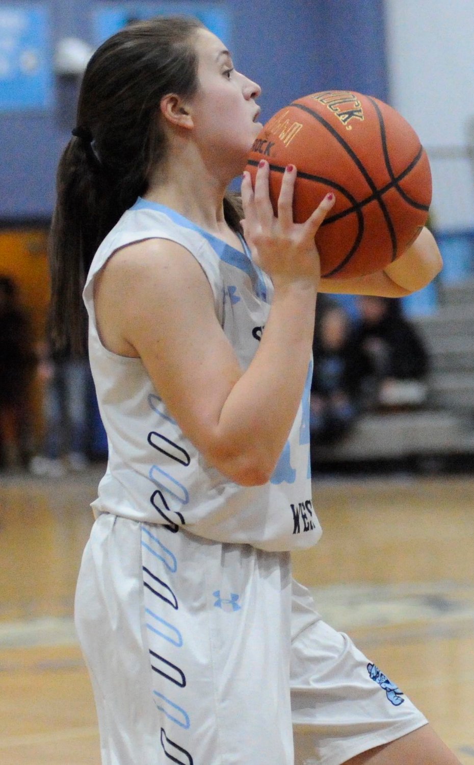 Sullivan West’s Brielle Arnott sets up for a 3-pointer outside the arc. She went on to lead the Lady Bulldogs with 14 points, netting four 3-pointers and a 2-0 at the free throw line.