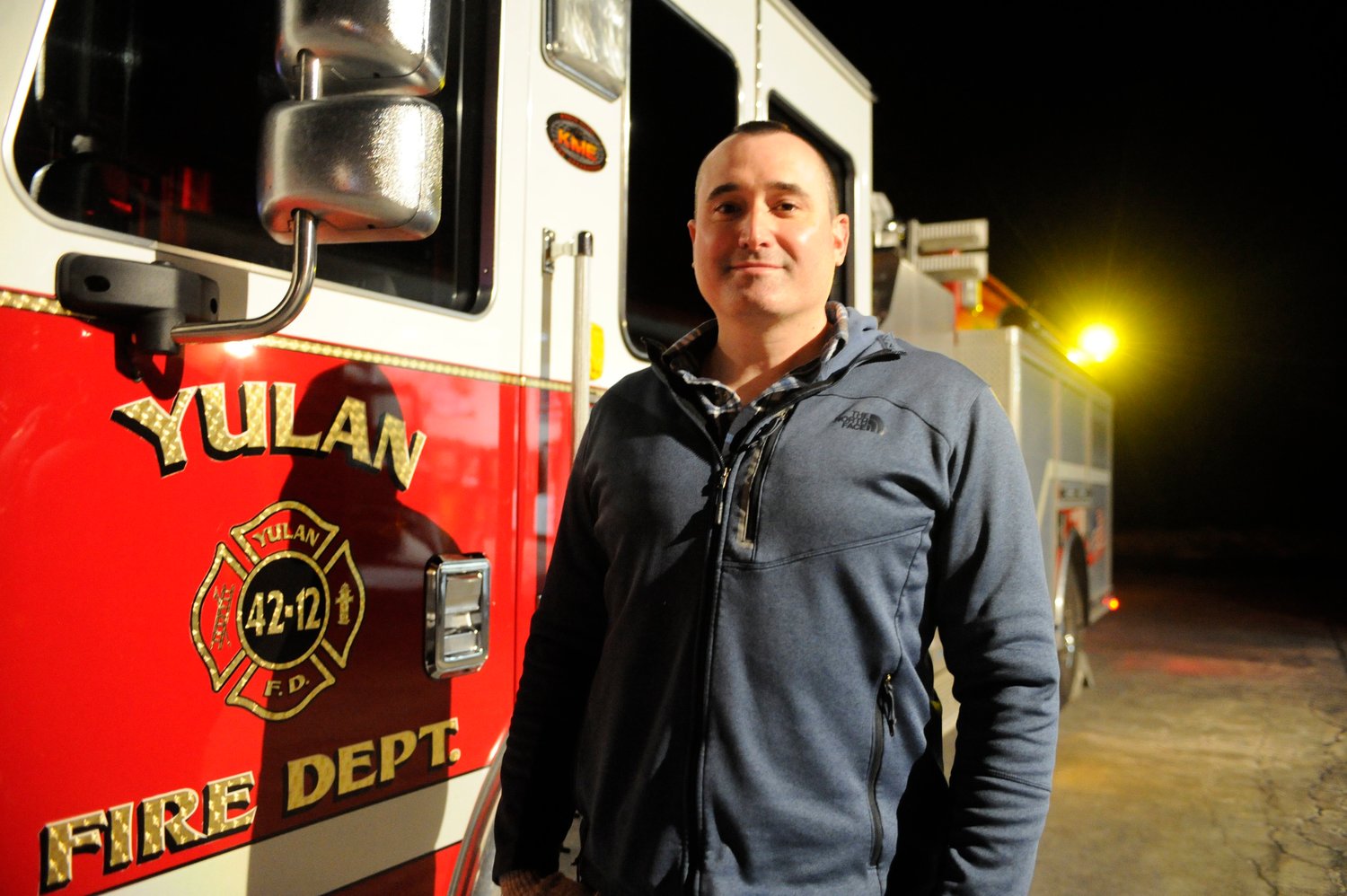 Phil Deyermond, chief of the Yulan Volunteer Fire Department, follows a family tradition of service; both his father and grandfather were firefighters.