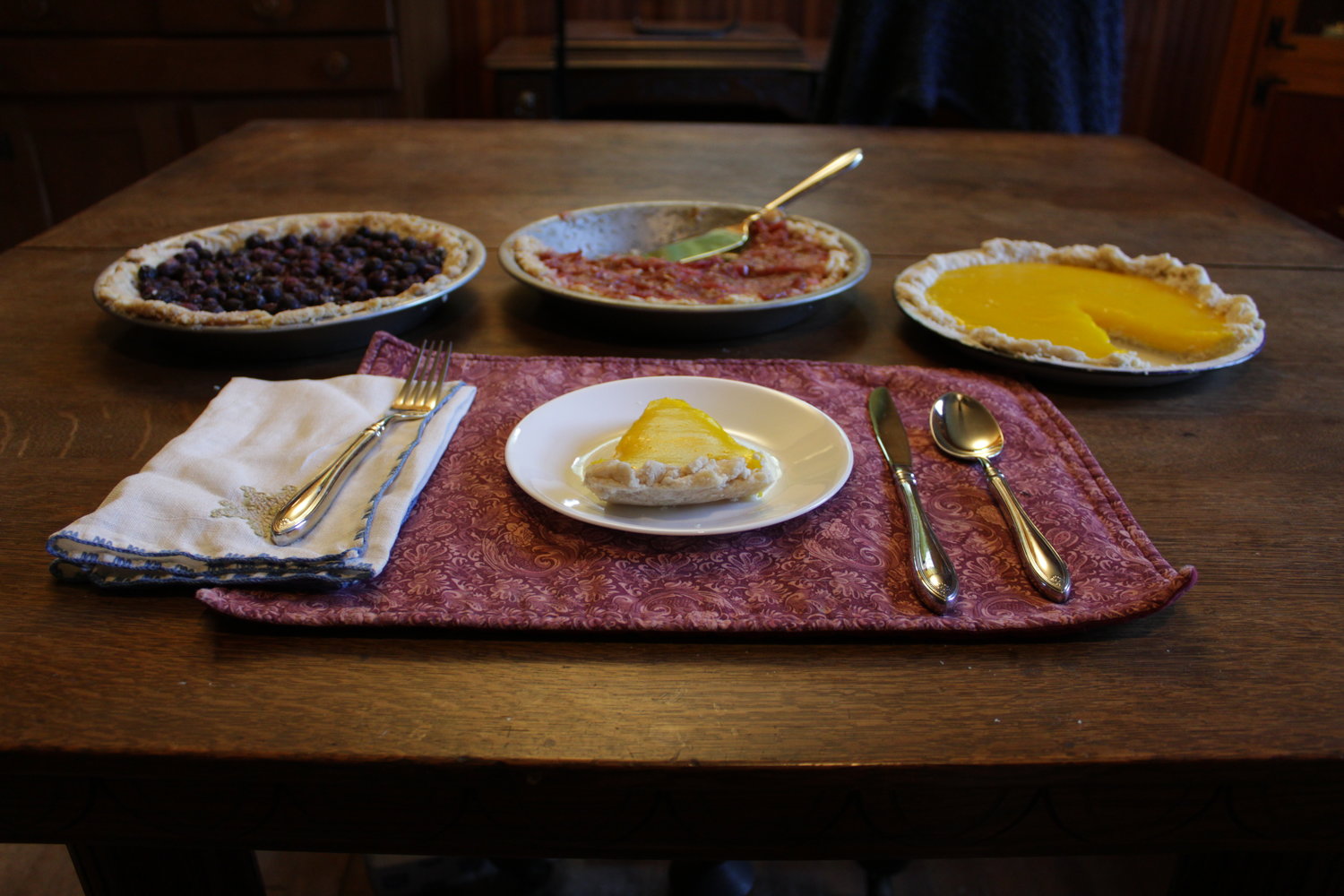 This is what happens when the pies sit in the fridge. Someone eats them. From left, blueberry, rhubarb and lemon.
