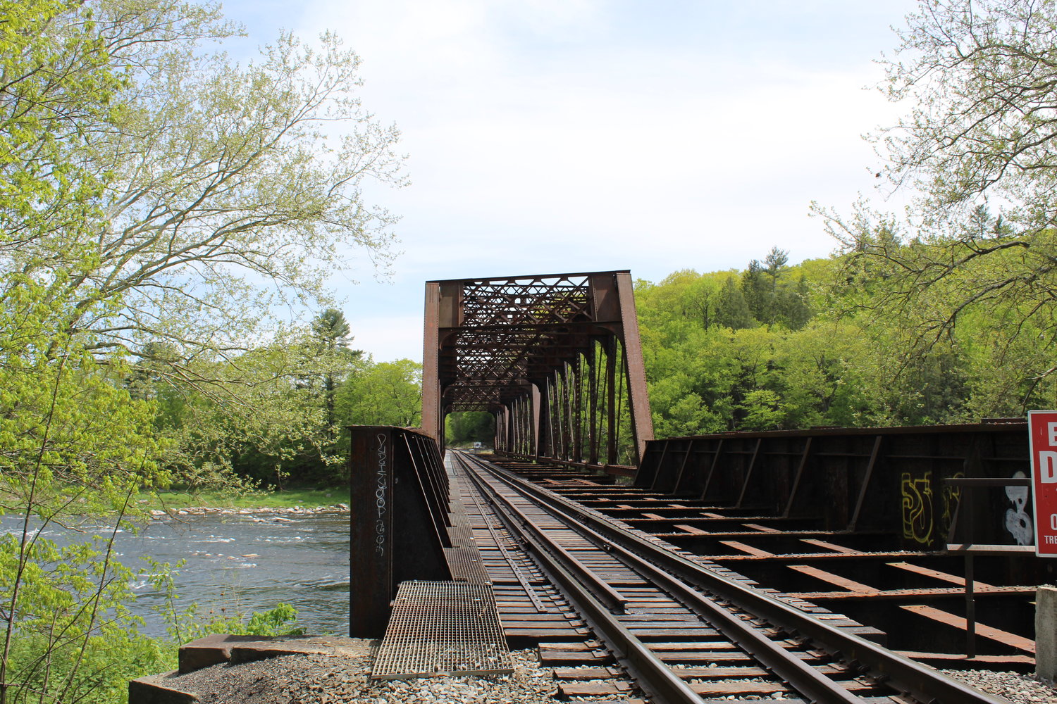 The Erie train tracks over Ten Mile River.